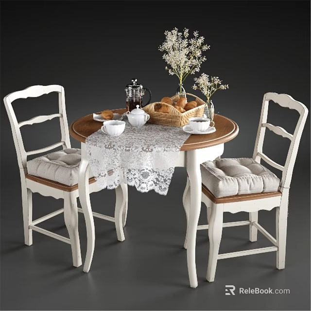 Round Wooden Table With White Cushioned Chairs Lace Tablecloth Bread Teapot And White Flowers 3d model 