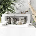 Minimalist Perfume Cosmetics Display With White Stand Green Plants And Mirror