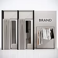 Modern Clothing Store With Fashion Clothes Hanging Rack Glass Door Wardrobe And Brand Sign