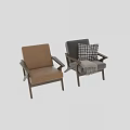 Gray Fabric Accent Chair With Wooden Armrests Black White Checkered Pillow And Beige Fringed Blanket