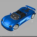 Blue Convertible Sports Car With Black Seats Spoiler And Silver Wheels