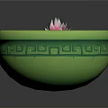 Pink Lotus Flower And Green Lily Pads In Green Patterned Bowl On Water Surface