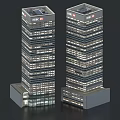 Twin Modern High Rise Office Buildings With Glass Curtain Walls And Illuminated Exteriors