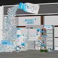 Blue Themed Art Installation With Floating Milk Bottle And Scattered Decorations