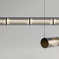 Modern Transparent Cylinder Pendant Light With Brass Accents And Hanging Design