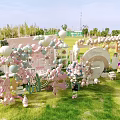 Exhibition Booth Decorations With Pastel Balloons And Ornaments On Green Lawn Setup
