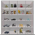 Plush Toys Displayed On White Shelf With Stuffed Animals And Various Toy Vehicles
