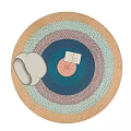 Round Rug With Colorful Layered Design White Cushion And Open Book In Cozy Interior