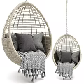Wicker Hanging Sofa Set With Gray Cushions Cozy Blanket And Tassels Design