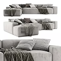 Neutral Gray Sectional Sofa With Cozy Blankets And Decorative Pillows 3d model