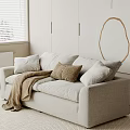Light Gray Two Seater Sofa With Soft Cushions And Throw Blanket In Modern Minimalist Room