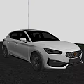White Sporty Hatchback Car Parked On Gray Asphalt With Black Rims Near Yellow Leaf Tree