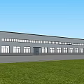 Modern Industrial Factory Exterior With Steel Structure Large Windows And Green Surroundings