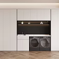 Modern Laundry Room Interior With White Cabinets Black Countertop Washing Machines And Herringbone Floor