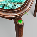 Modern Dining Table With Green Brown Patterned Top And Vase Of Colorful Flowers