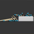 Open Blue Matchbox With Scattered Wooden Matches Blue Tips On Dark Surface