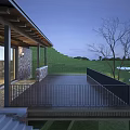 Modern Boutique Guesthouse With Wooden Deck Black Railings Large Glass Windows And Green Lawn Surroundings