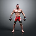 Muscular Shirtless Man With Tattoos In Black Boxing Gloves Red White Shorts Against Gray Background