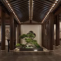 Traditional Chinese Style Hotel Lobby With High Ceiling Wooden Structures And Central Stone Basin