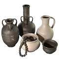 Handcrafted Ceramic Vessels in Various Shapes with Textured Black and White Designs