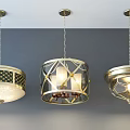 Three Unique Chandeliers With Metal Frames And Decorative Lampshades