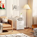 Modern Living Room With White Drawer Shelf Sofa Floor Lamp And Decorative Paintings