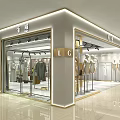 Modern Fashion Store Interior With Clothing Displays Mannequins And Golden Decorative Accents