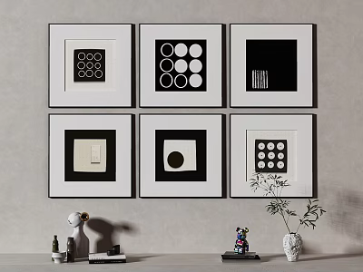 Six Framed Black And White Geometric Artworks On Wall With Decorative Items Below 3d model