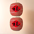 Two Traditional Red Lanterns Featuring Fortune Characters And Lattice Design