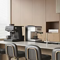 Modern Kitchen Interior With Black And Silver Coffee Makers On Countertop And Cabinets