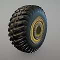 Heavy Duty Off Road Tire With Deep Tread And Yellow Metal Rim Design