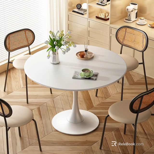 Elegant Round Dining Table Set with Rattan Back Chairs White Tabletop and Floral Vase on Wooden Floor 3d model 