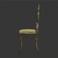 Ornate Vintage Chair With Intricately Carved Backrest And Light Yellow Cushion