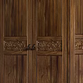 Carved Wooden Wardrobe With Open Interior Hanging Clothes And Folded Shelves