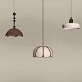 Stylish Pendant Lights In Brown And White With Unique Designs Hanging On Beige Wall