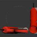 Red Toy Gun With Black Grip And Silver Cylinder Accessory On Dark Surface