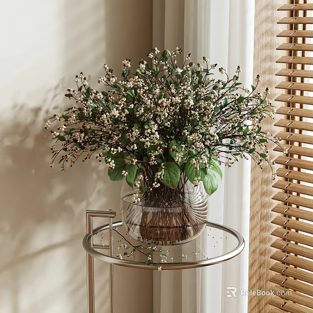 Transparent Glass Vase With White Small Flowers Green Leaves On Metal Stand Table 3d model 