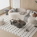Modern White Curved Sofa Coffee Table Set With Polka Dot Rug and Floor Lamp