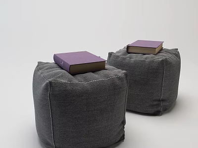 Gray Fabric Ottomans With Purple Cover Books Placed On Top For Home Decor 3d model
