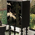 Black Chest of Drawers Featuring Crane Patterns With Window Blinds White Curtains And Green Plants
