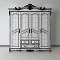 Ornate White Wardrobe With Carved Ornaments Against Green Wall And Functional Bottom Drawers