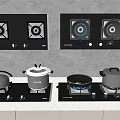Modern Kitchen Countertop With Black Gas Stoves Cooktops And Pots Pans