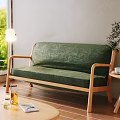 Green Multi Seat Sofa With Wooden Armrests And Textured Cover By Window With Floor Lamp And Side Table
