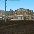 Old Brick Storefront Buildings With Vintage Signage And Utility Poles On Cobblestone Street