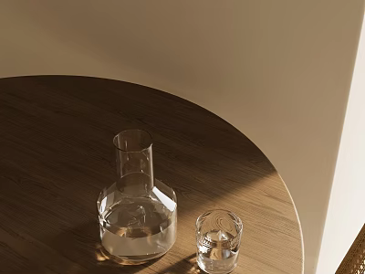 Clear Glass Cup And Carafe On Wooden Round Table With Light Colored Wall And Sunlight 3d model