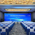 2025 China Digital Economy Innovation Summit Venue With Blue White Chairs Screen And Chandeliers