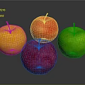 Four Colorful Apples in Yellow Red Pink and Green on Dark Background