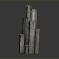 Stone And Wood Stacked Decorative Sculpture With Various Heights And Textured Surfaces