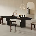 Modern Black Dining Table Set With Wooden Chairs Vase Candles And Pendant Light