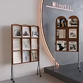 Modern Wooden Bookshelf with Magazines Metal Stands and Lighting on Gray Wall